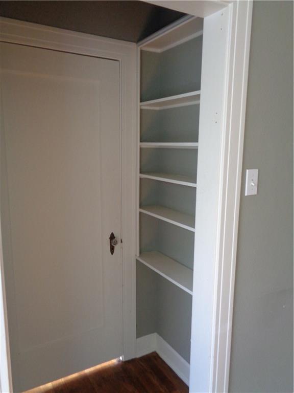 3106 Walling Drive Austin, TX 78705 - Photo 23 of 30 a view of walk in closet with empty racks