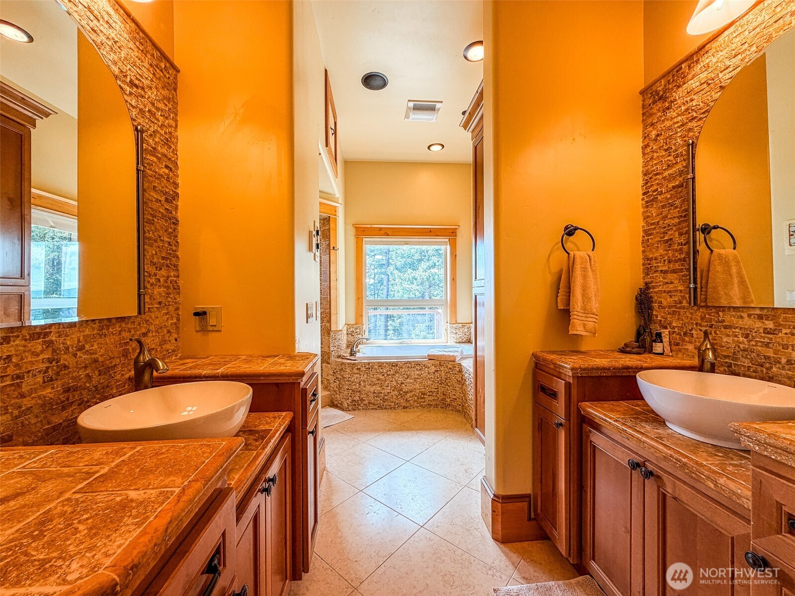 726 Pine Ridge Drive Orcas Island, WA 98280 - Photo 14 of 40 a bathroom with a granite countertop sink and a mirror