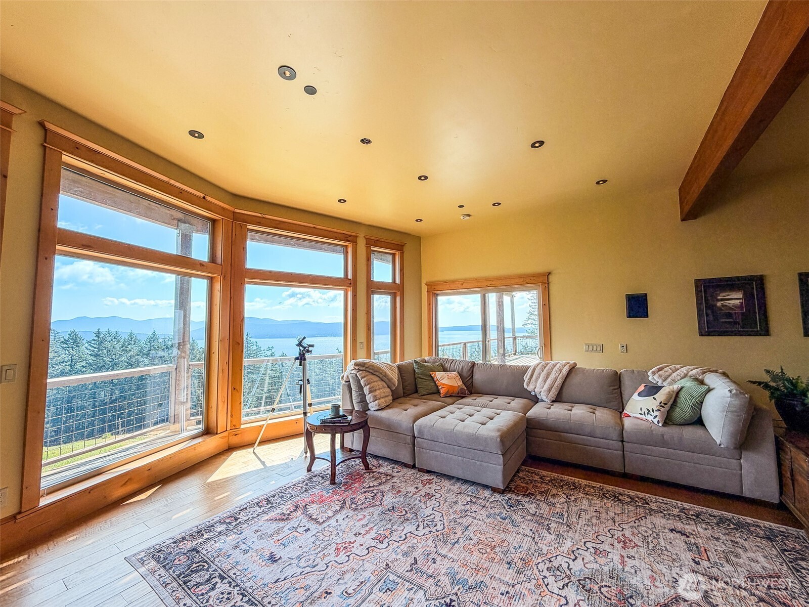 726 Pine Ridge Drive Orcas Island, WA 98280 - Photo 29 of 40 a spacious bedroom with a bed and glass window