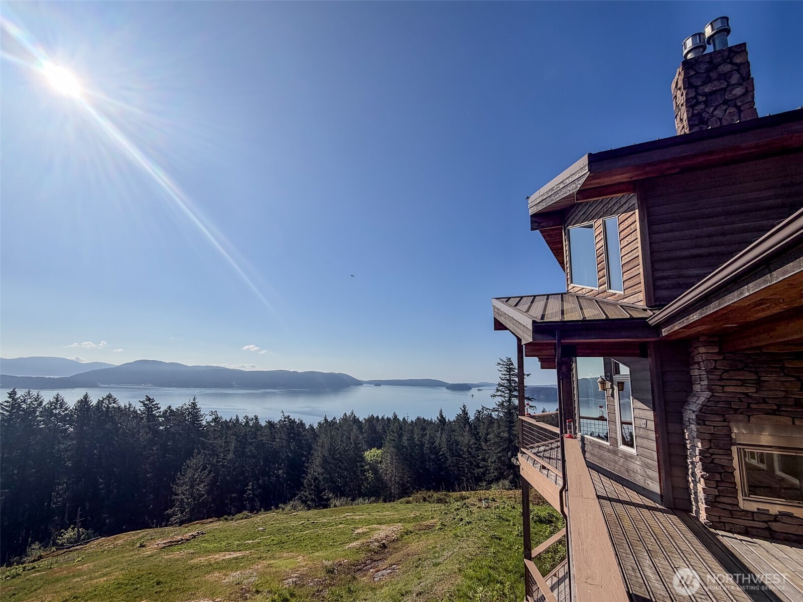 726 Pine Ridge Drive Orcas Island, WA 98280 - Photo 33 of 40 a view of a house with a yard