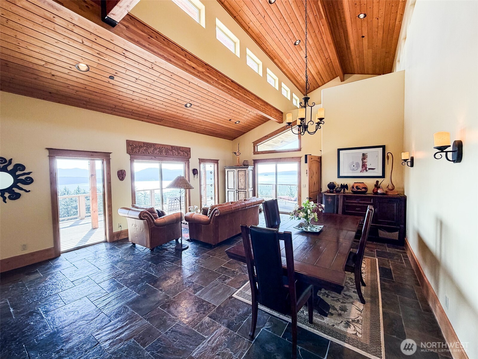 726 Pine Ridge Drive Orcas Island, WA 98280 - Photo 9 of 40 a view of a dining room with furniture window and wooden floor
