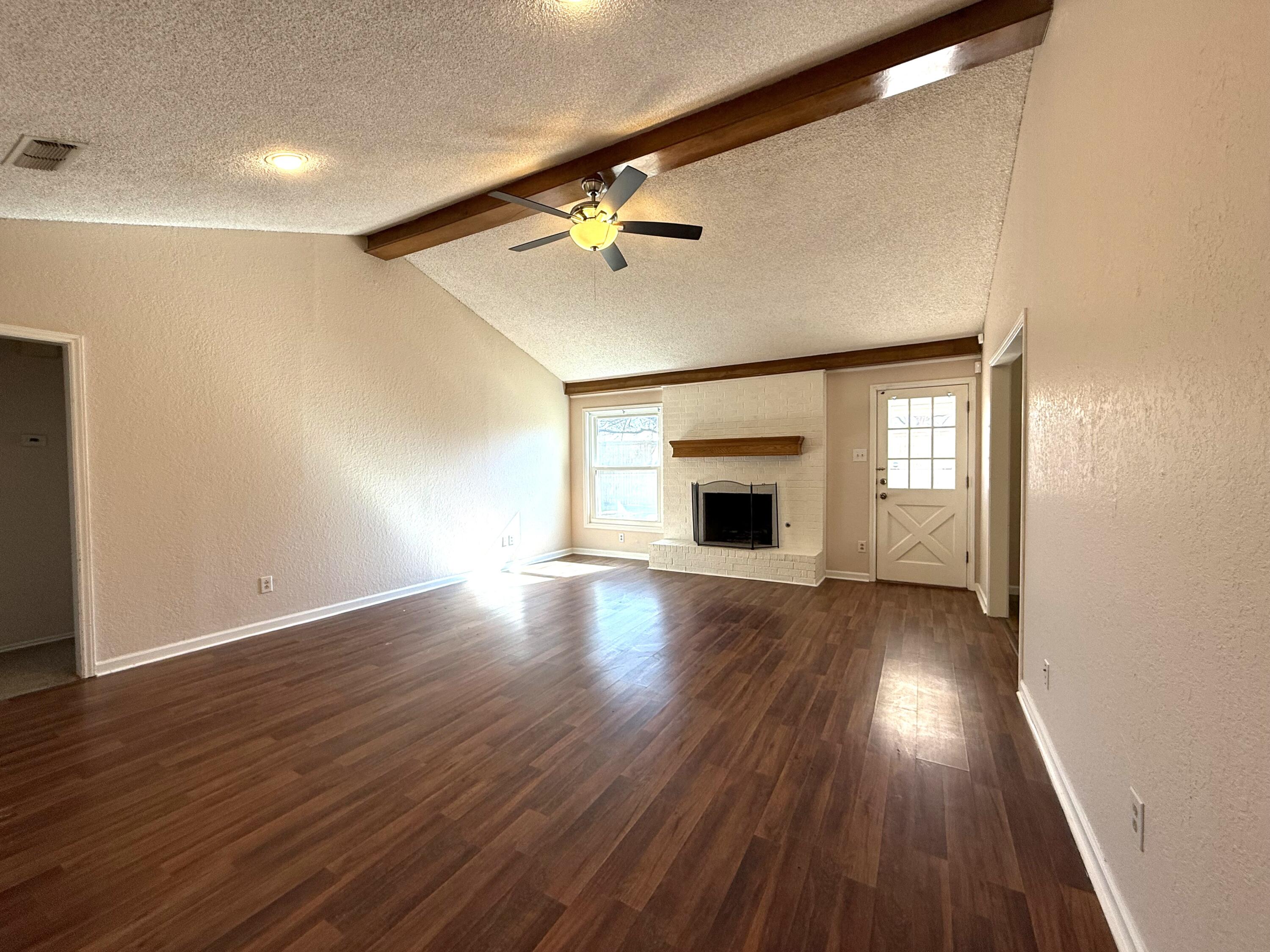 5729 89th Street Lubbock, TX 79424 - Photo 2 of 15 living room 2