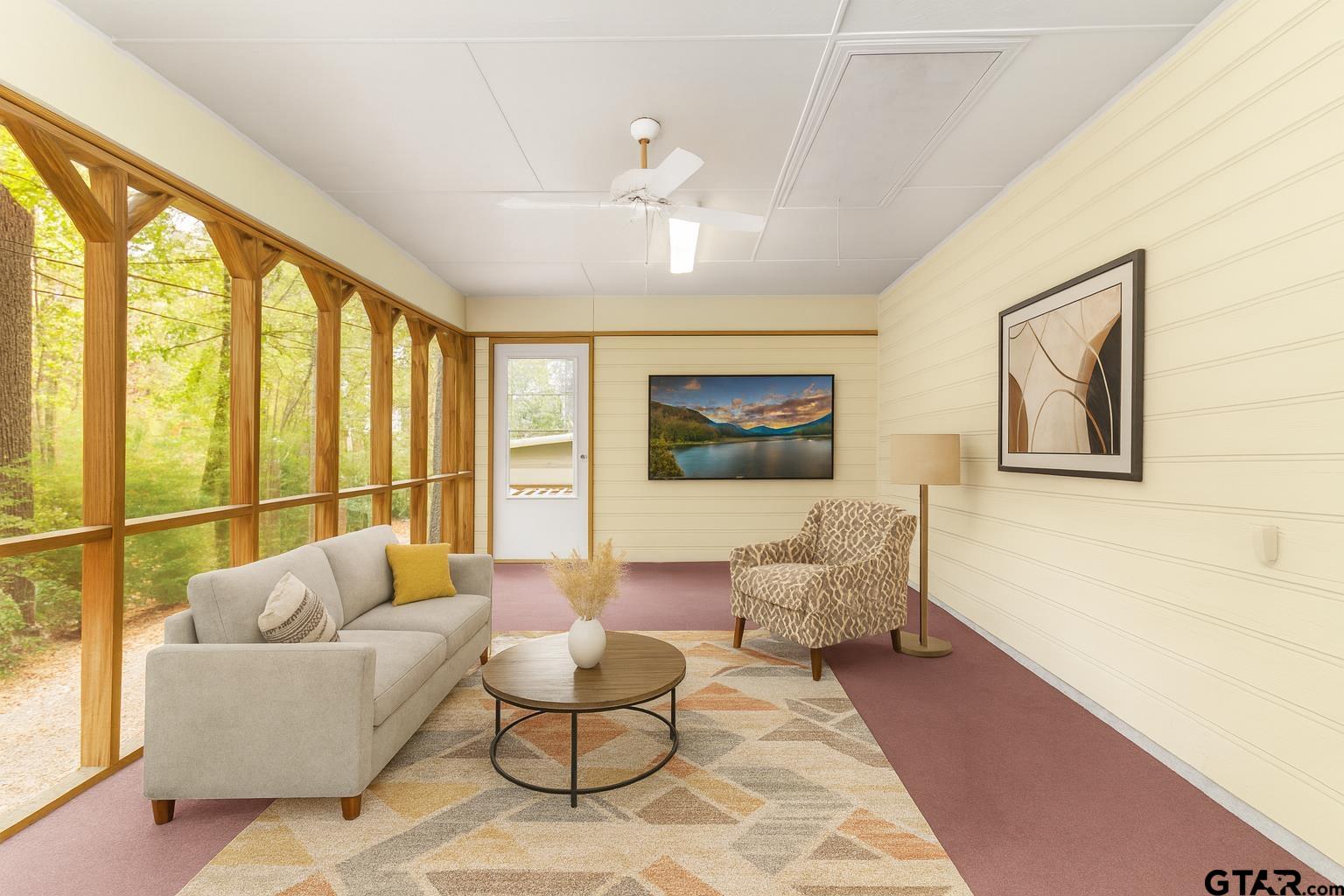 109 King Lyle Road Scroggins, TX 75480 - Photo 27 of 46 a living room with furniture and a large window