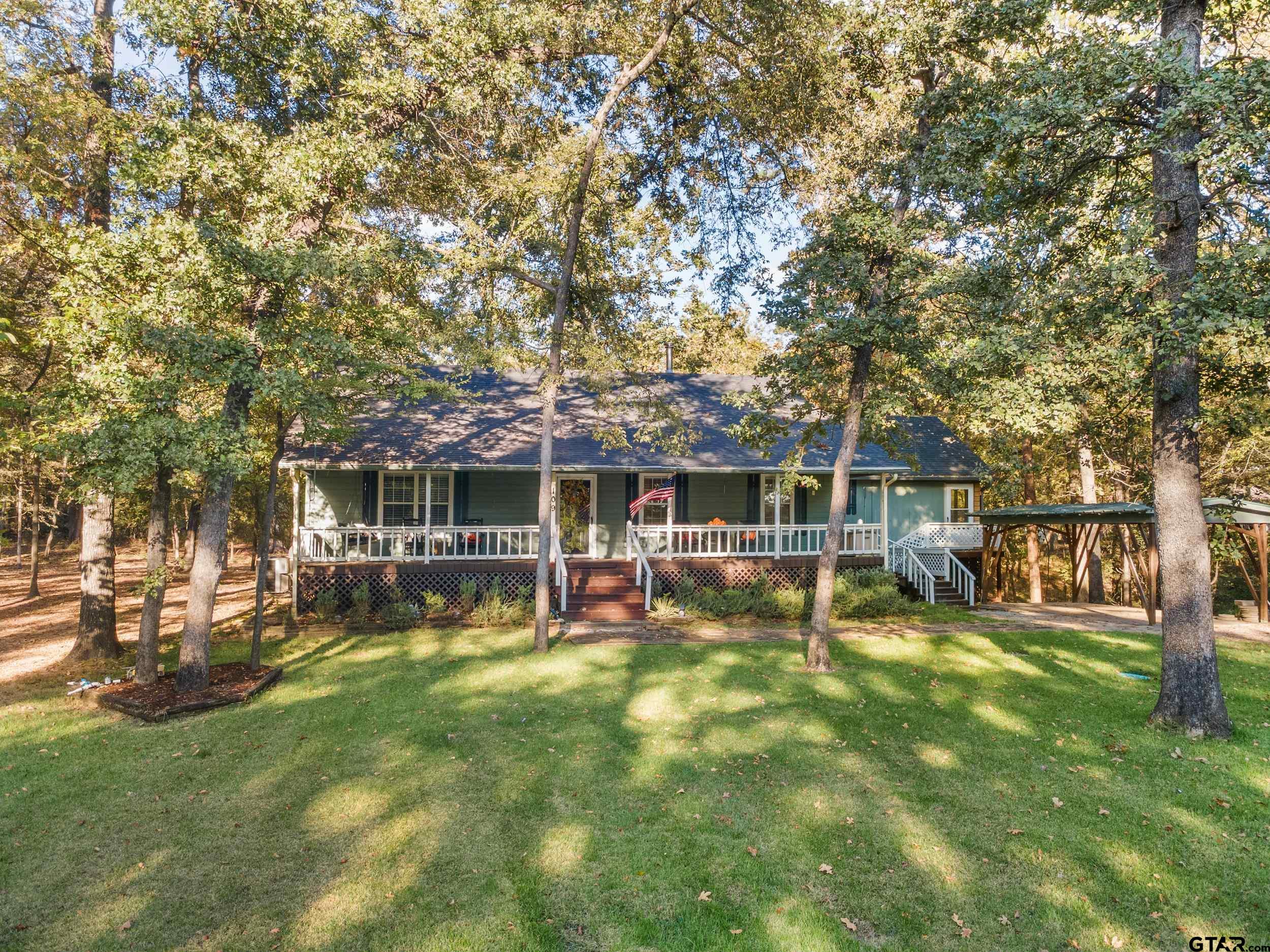 109 King Lyle Road Scroggins, TX 75480 - Photo 3 of 46 a view of a house with a yard porch and sitting area