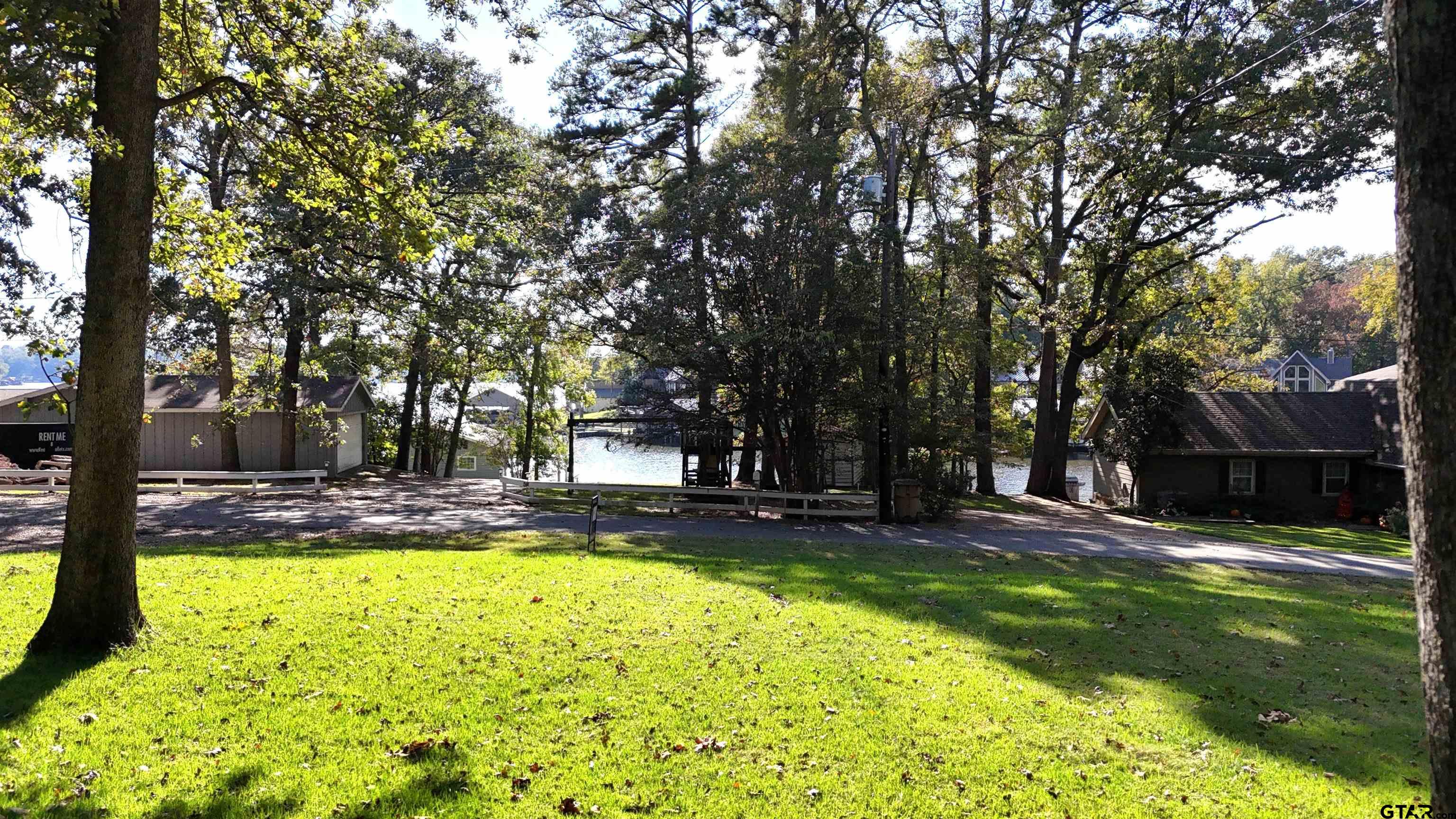 109 King Lyle Road Scroggins, TX 75480 - Photo 5 of 46 a view of a swimming pool with an outdoor space and seating area