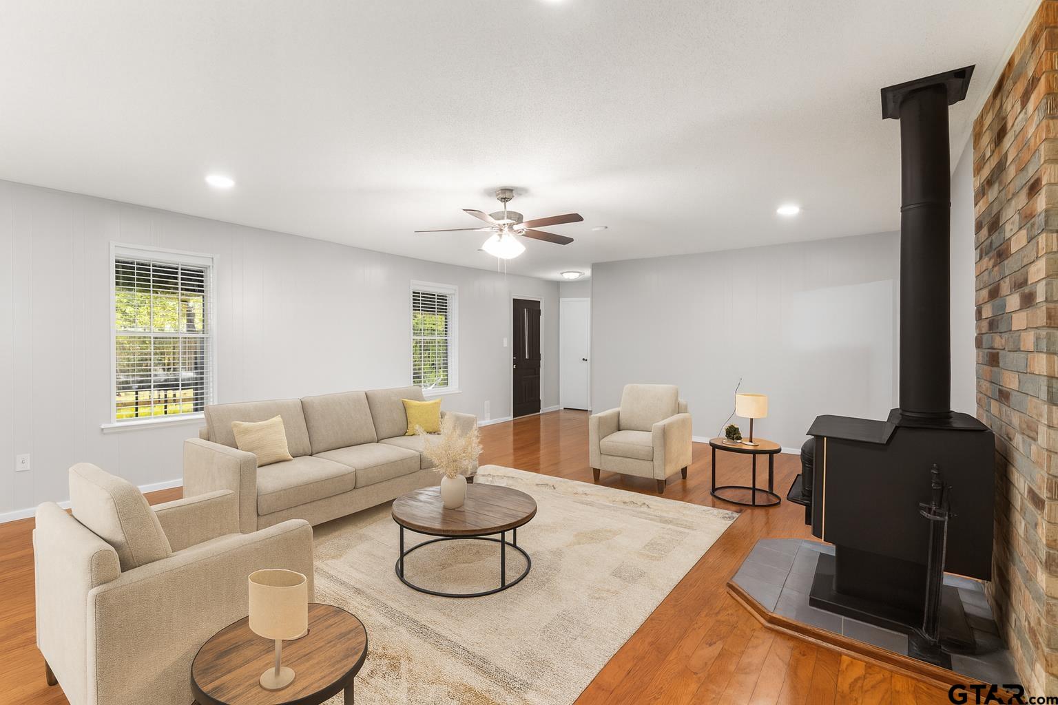 109 King Lyle Road Scroggins, TX 75480 - Photo 8 of 46 a living room with furniture and a fireplace