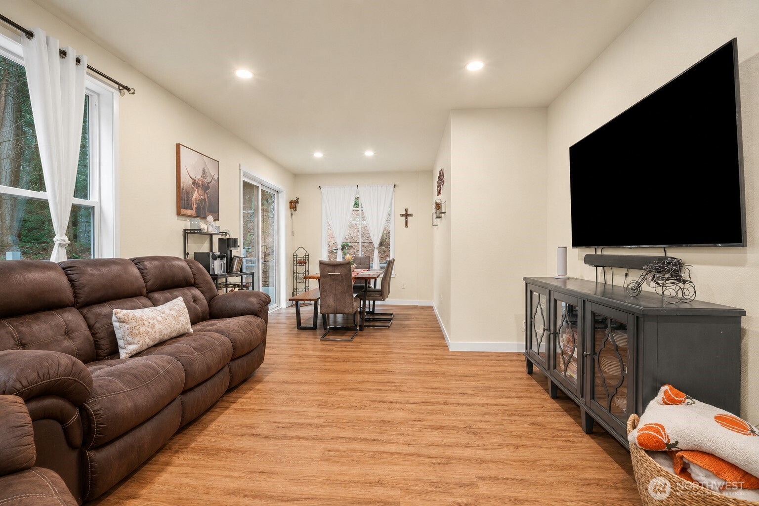 23 Spring Court Bellingham, WA 98229 - Photo 4 of 38 a living room with furniture and a flat screen tv