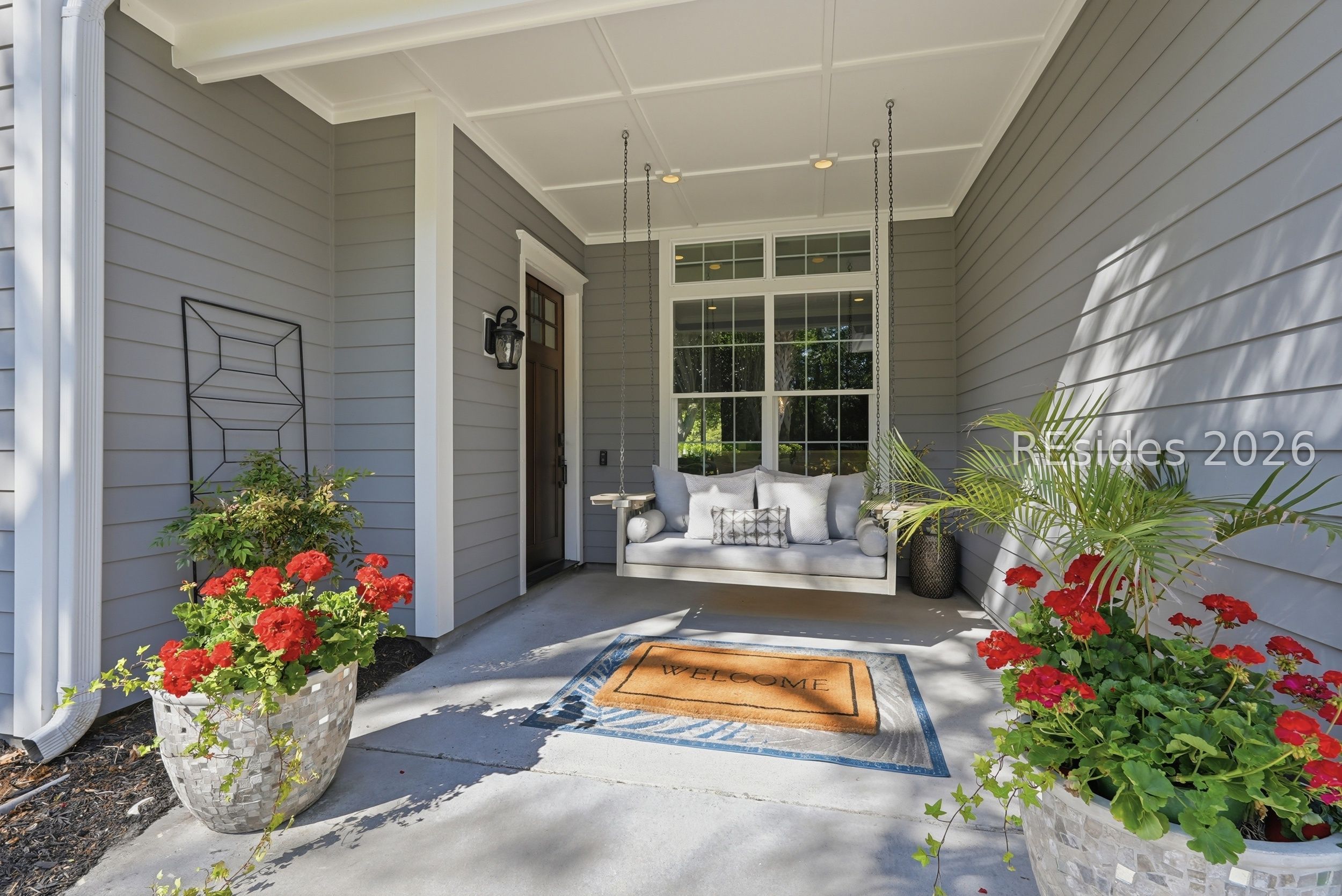 71 Tucker Ridge Court Hilton Head Island, SC 29926 - Photo 3 of 49 Front porch with adorable porch swing