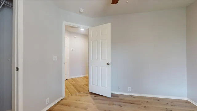 a view of entryway with wooden floor