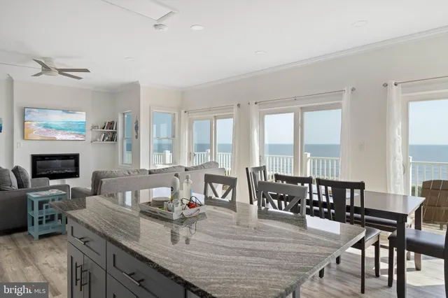 a living room with fireplace furniture and a flat screen tv