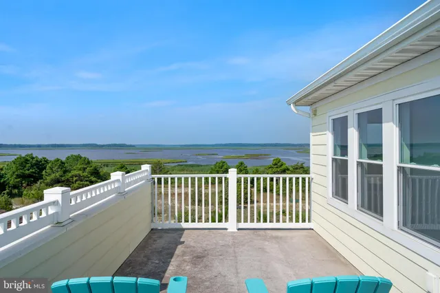 a view of a wooden fence