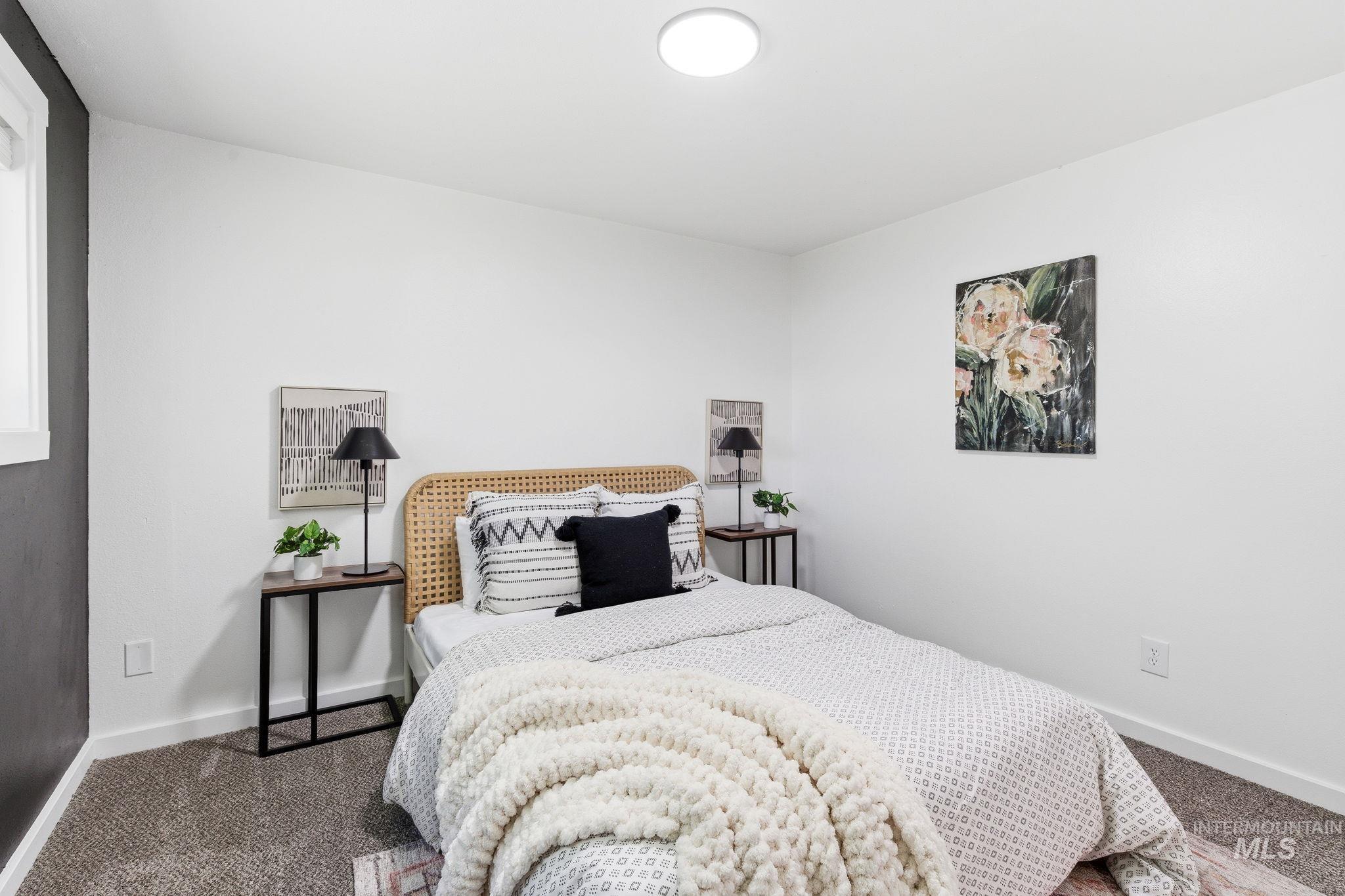2224 Rachel Circle Boise, ID 83706 - Photo 27 of 50 Room featuring white walls with a contrasting accent wall, neutral carpet flooring, and a recessed ceiling light fixture