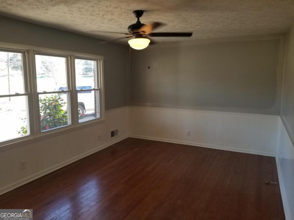 5003 Calhoun Road Northeast Adairsville, GA 30103 - Photo 9 of 11 an empty room with a window