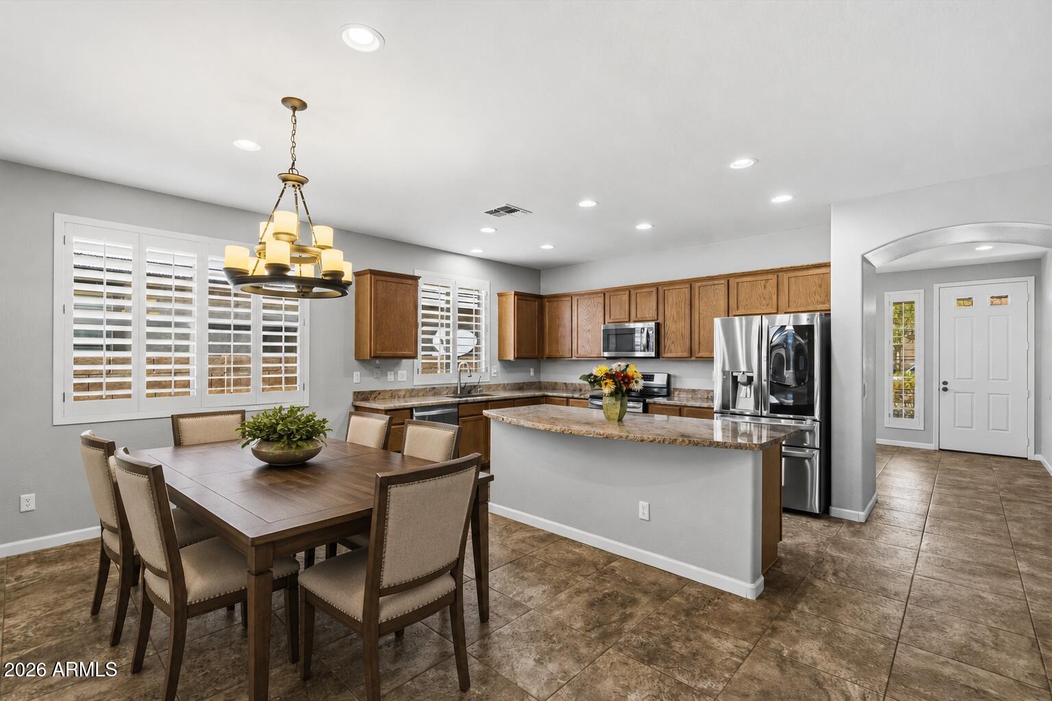 3009 West Trapanotto Road Phoenix, AZ 85086 - Photo 8 of 42 V Staged dining table