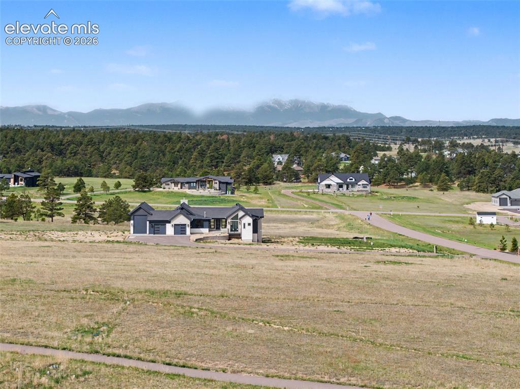 11691 Rambling Road Colorado Springs, CO 80908 - Photo 8 of 28 a view of a town with an ocean view