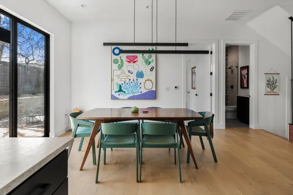a view of a dining room with furniture
