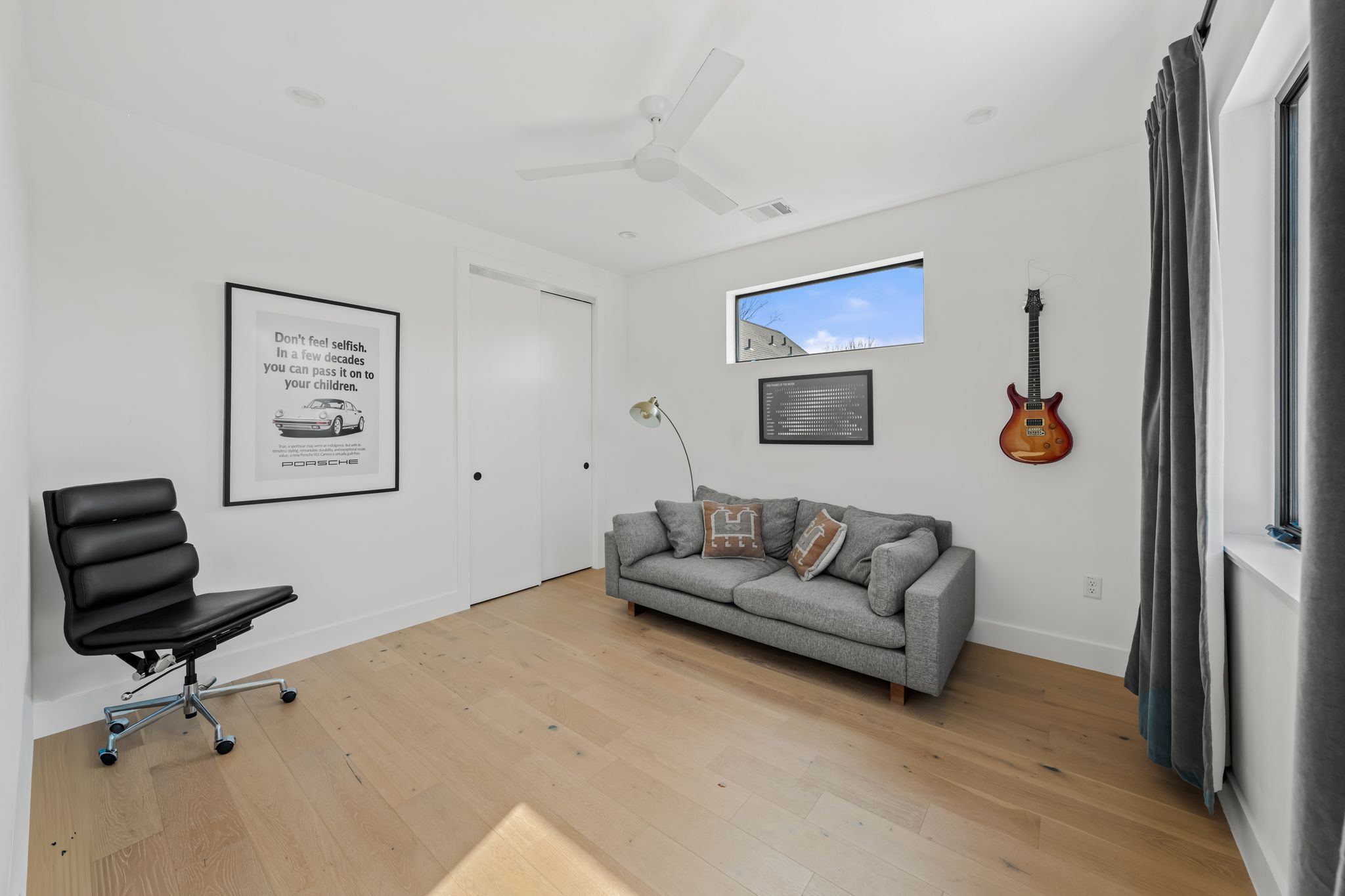 1301 Deloney Street Austin, TX 78721 - Photo 29 of 37 a living room with furniture and a chair