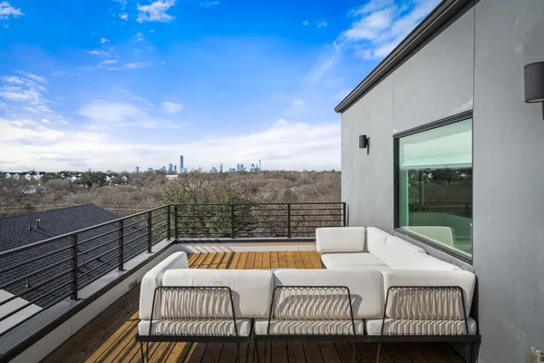 a view of a balcony with a couch