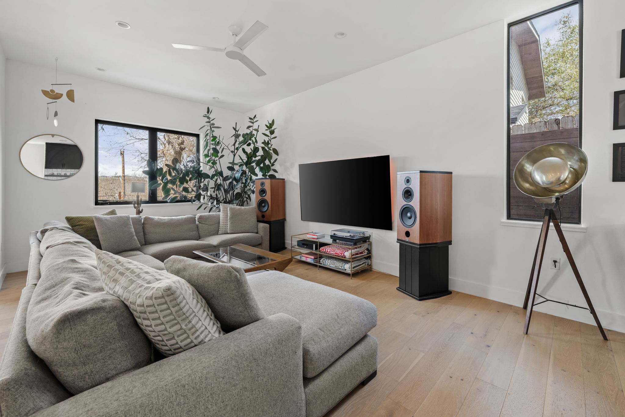 1301 Deloney Street Austin, TX 78721 - Photo 7 of 37 a living room with furniture and a flat screen tv
