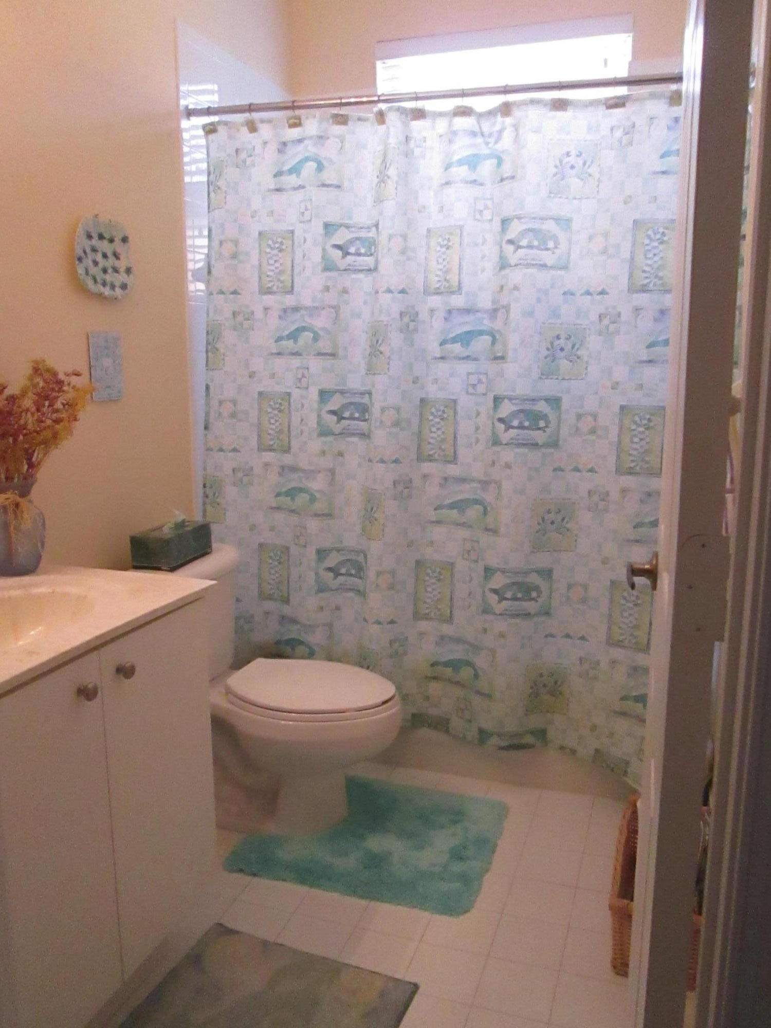 2104 Northwest Marsh Rabbit Lane Jensen Beach, FL 34957 - Photo 23 of 25 Guest bathroom