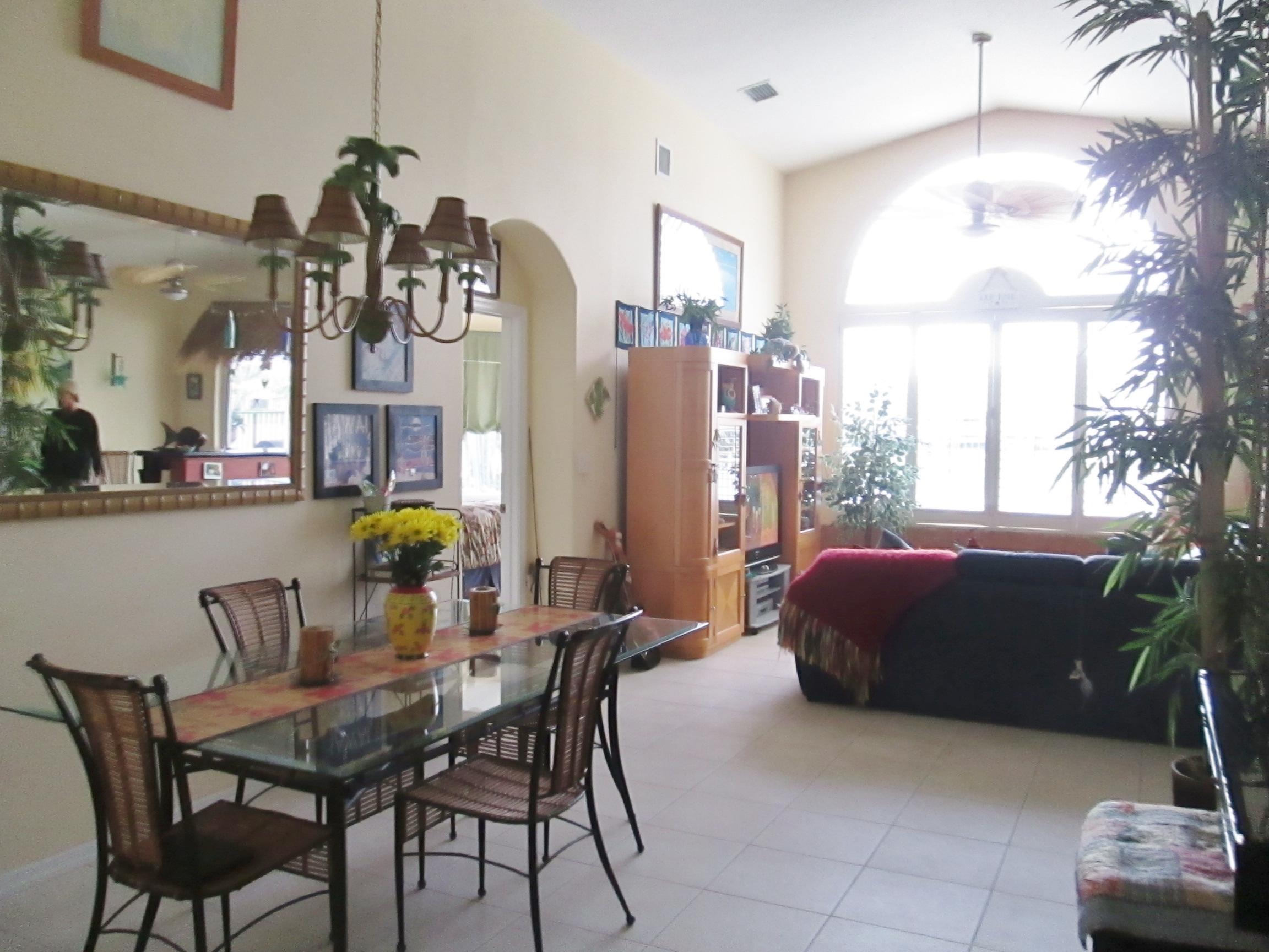 2104 Northwest Marsh Rabbit Lane Jensen Beach, FL 34957 - Photo 10 of 25 Dining - Living room