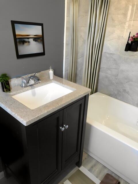 1967 Cleveland Street Gary, IN 46404 - Photo 27 of 38 a bathroom with a sink and a mirror
