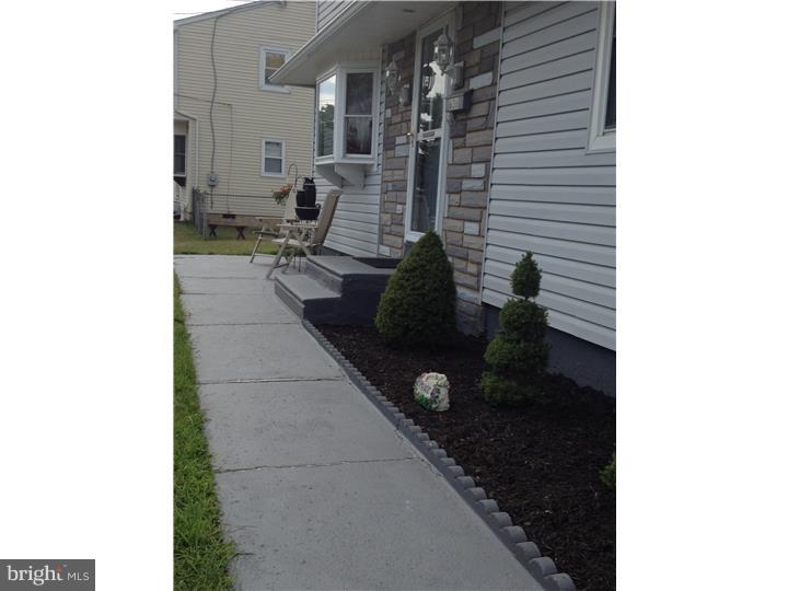 636 Burt Road Runnemede, NJ 08078 - Photo 3 of 18 a backyard of a house with outdoor seating