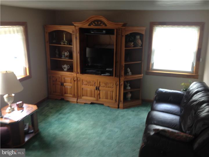 636 Burt Road Runnemede, NJ 08078 - Photo 7 of 18 a living room with furniture and a window