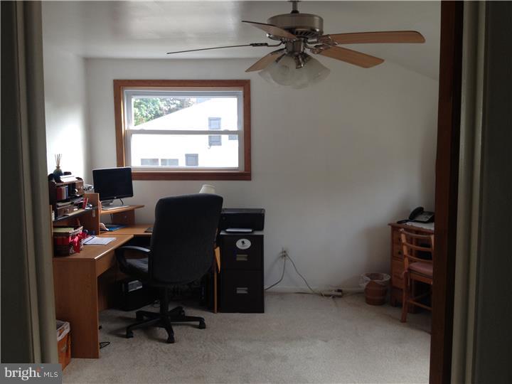 636 Burt Road Runnemede, NJ 08078 - Photo 9 of 18 a view of a workspace with furniture and a window