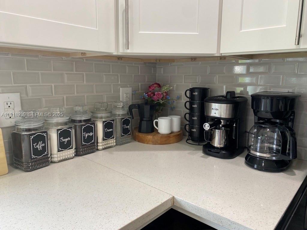 417 Cherry Tree Drive Sebring, FL 33876 - Photo 11 of 26 a close view of sink and cabinets