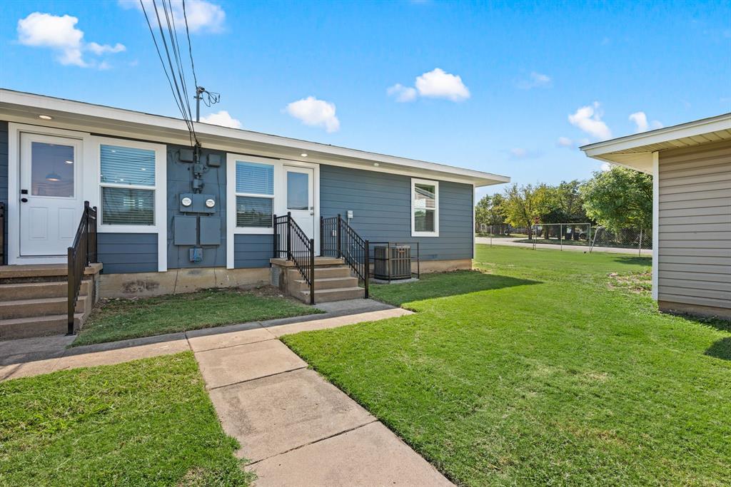 4096 Merida Avenue Fort Worth, TX 76110 - Photo 13 of 17 Sidewalks; Stoop; Grass aplenty in common areas