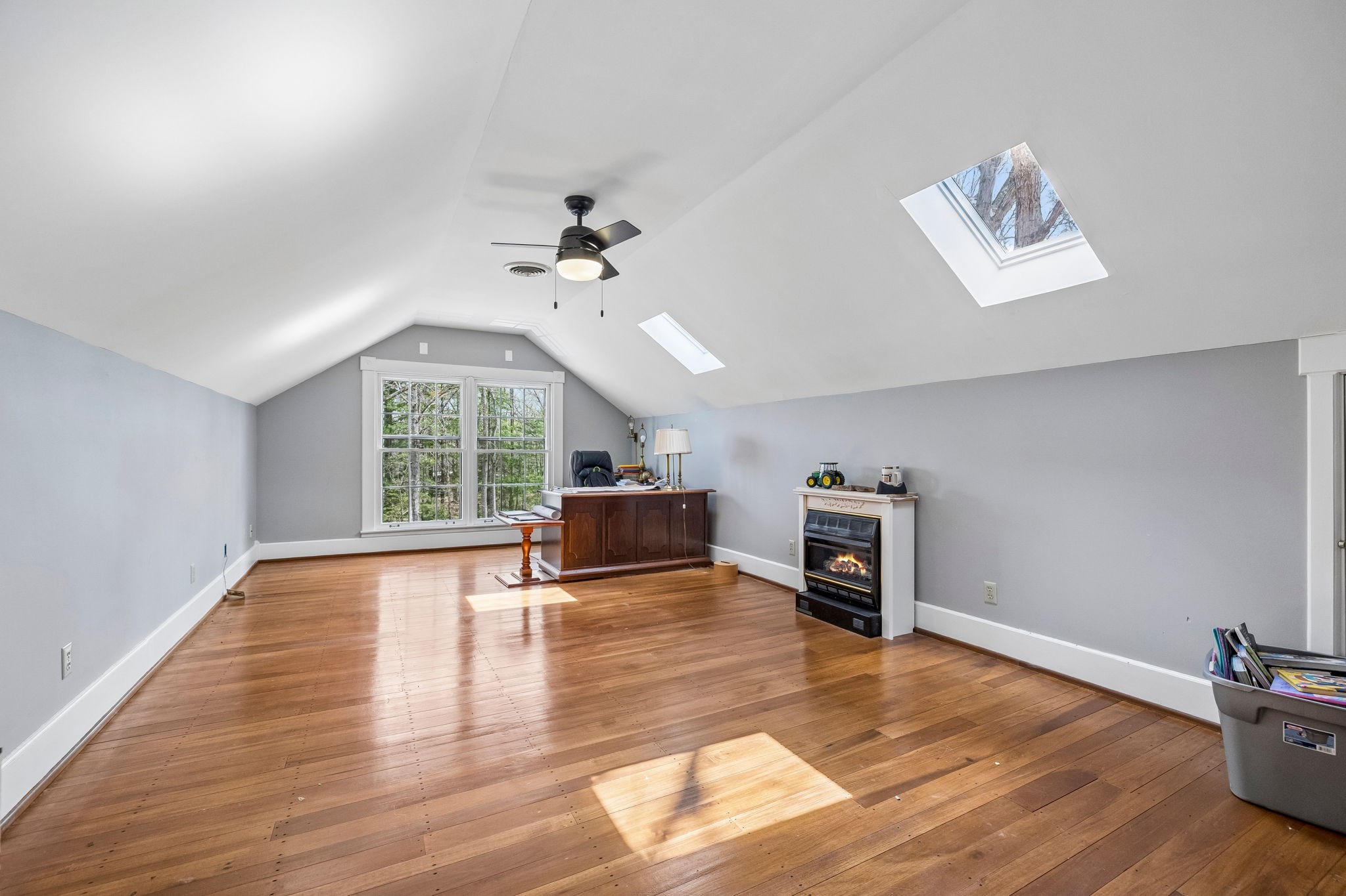 901 Town Branch Road Charlotte, TN 37036 - Photo 26 of 66 a view of an empty room with a window and wooden floor