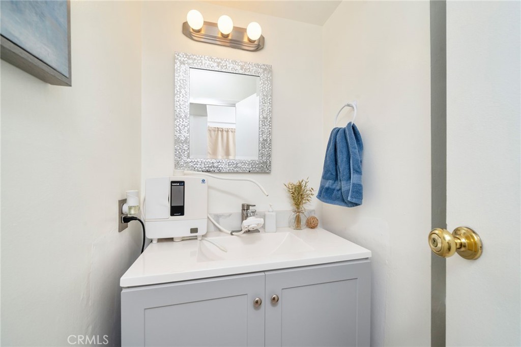 1800 West Gramercy Avenue, Unit 43 Anaheim, CA 92801 - Photo 15 of 34 a bathroom with a sink and a mirror