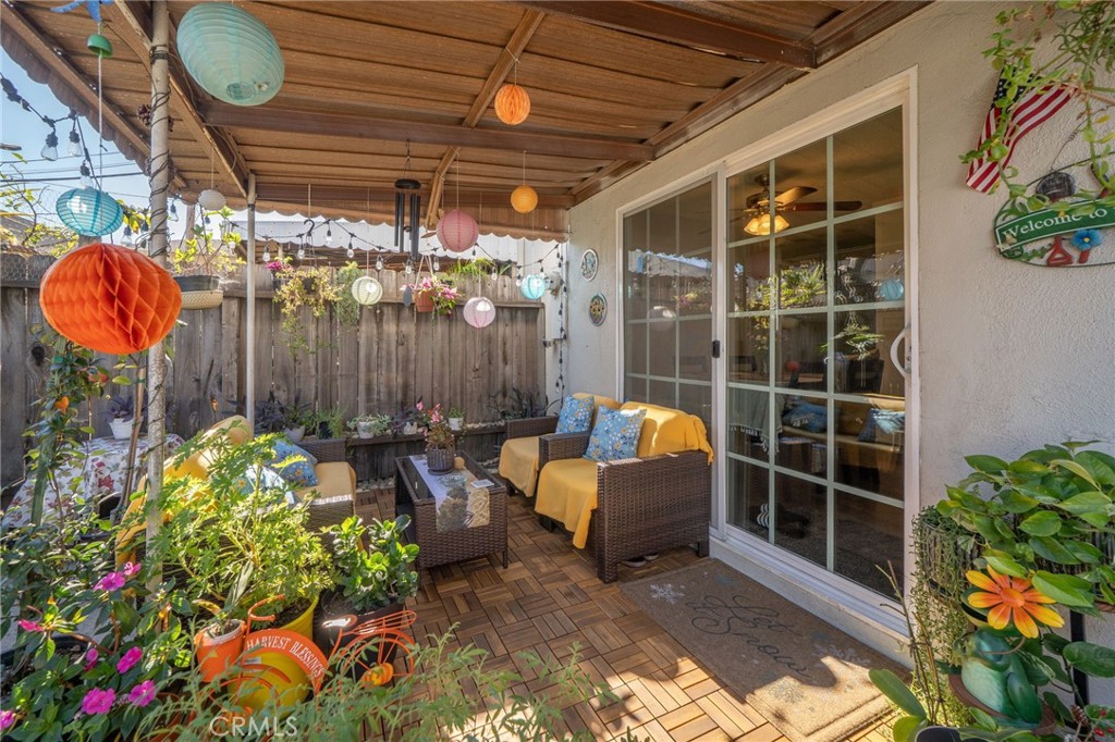 1800 West Gramercy Avenue, Unit 43 Anaheim, CA 92801 - Photo 23 of 34 a outdoor living space with patio furniture and a potted plant
