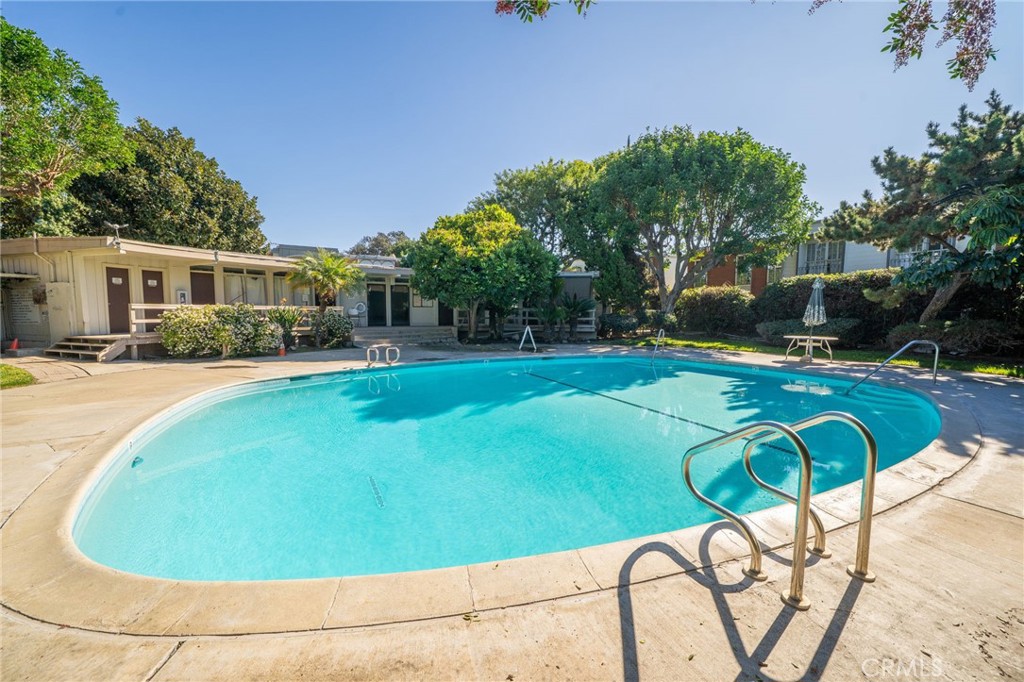 1800 West Gramercy Avenue, Unit 43 Anaheim, CA 92801 - Photo 34 of 34 a view of a swimming pool with a backyard
