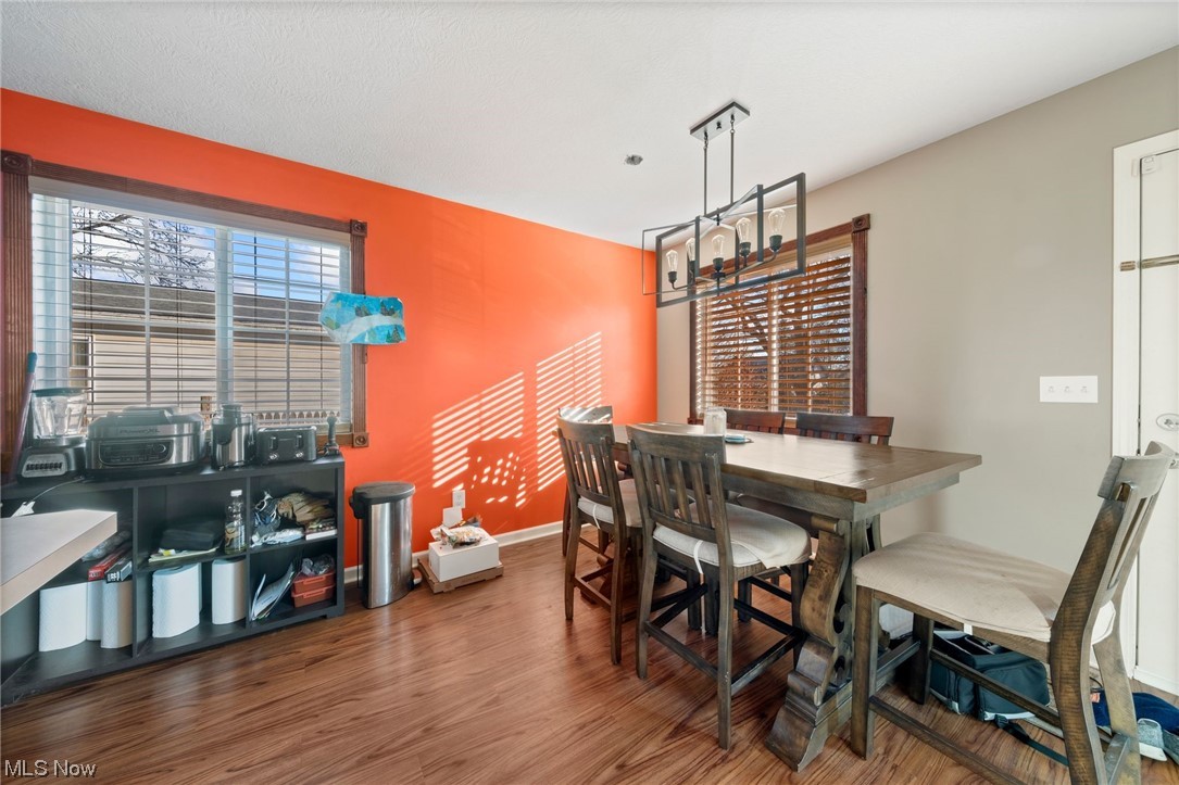 862 Nevin Street Akron, OH 44310 - Photo 9 of 28 Dining area featuring dark hardwood / wood-style floors