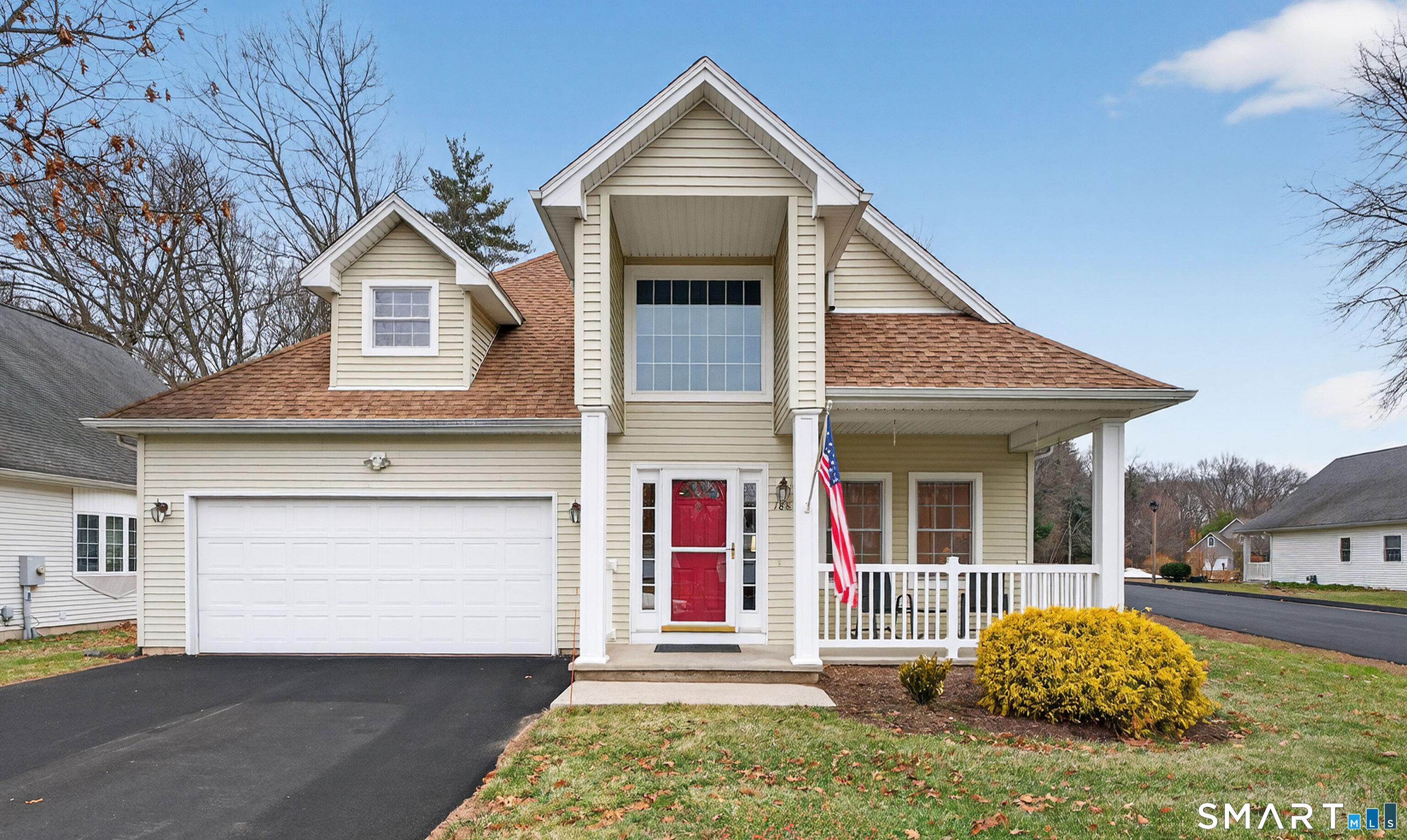 a front view of a house with a yard