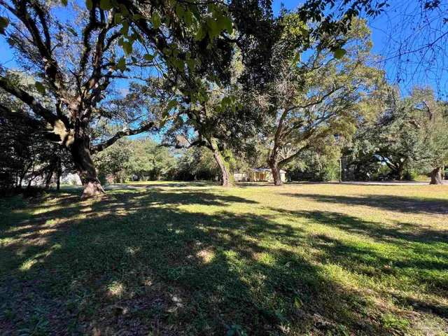 a view of a ground with green space