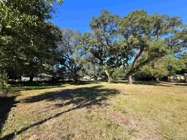 a view of swimming pool with an outdoor space and seating area