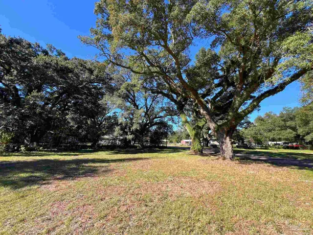 a view of swimming pool with an outdoor space and seating area