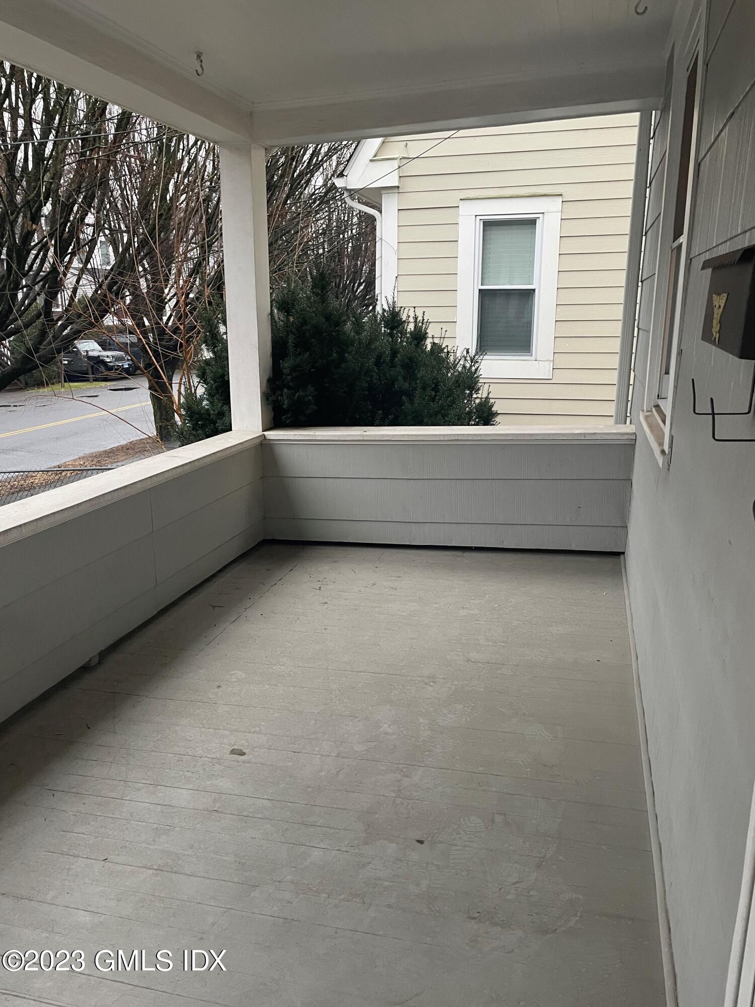 72 Prospect Street Greenwich, CT 06830 - Photo 2 of 18 a view of balcony with a couch