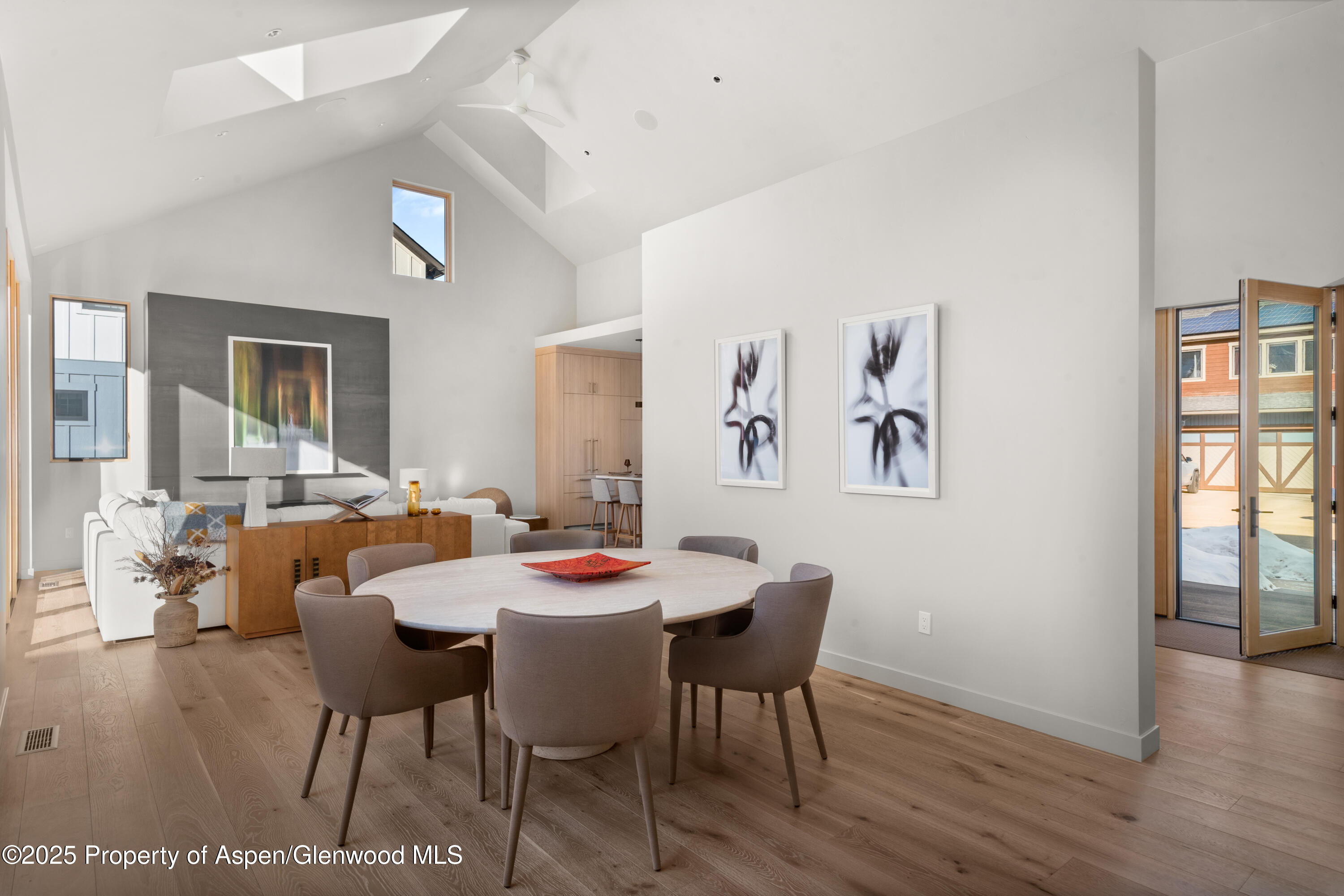 112 Valley Court Basalt, CO 81621 - Photo 7 of 37 a view of a dining room with furniture and wooden floor