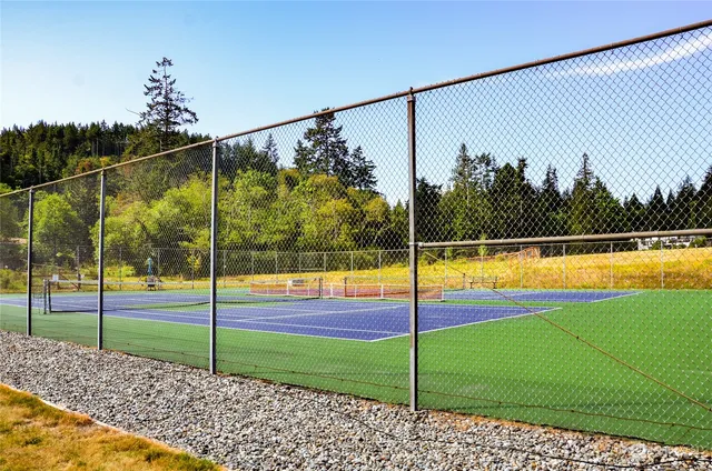 a view of a slide with sitting area