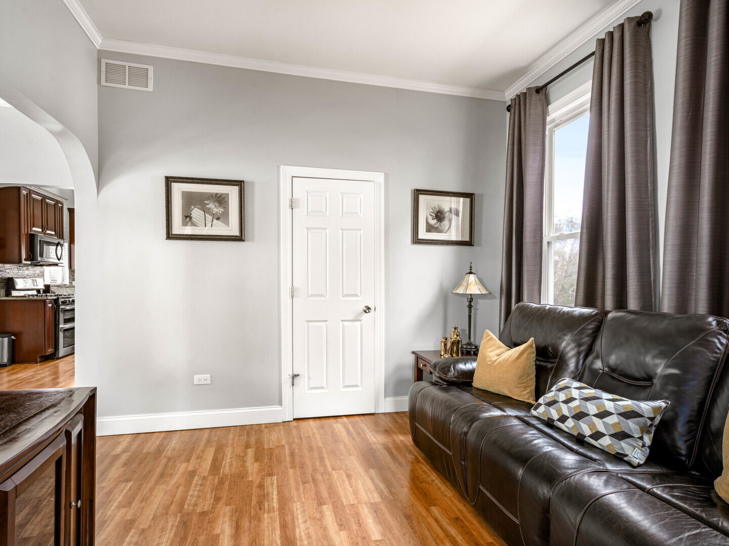 506 Oneida Street Joliet, IL 60435 - Photo 14 of 40 a living room with furniture and a window