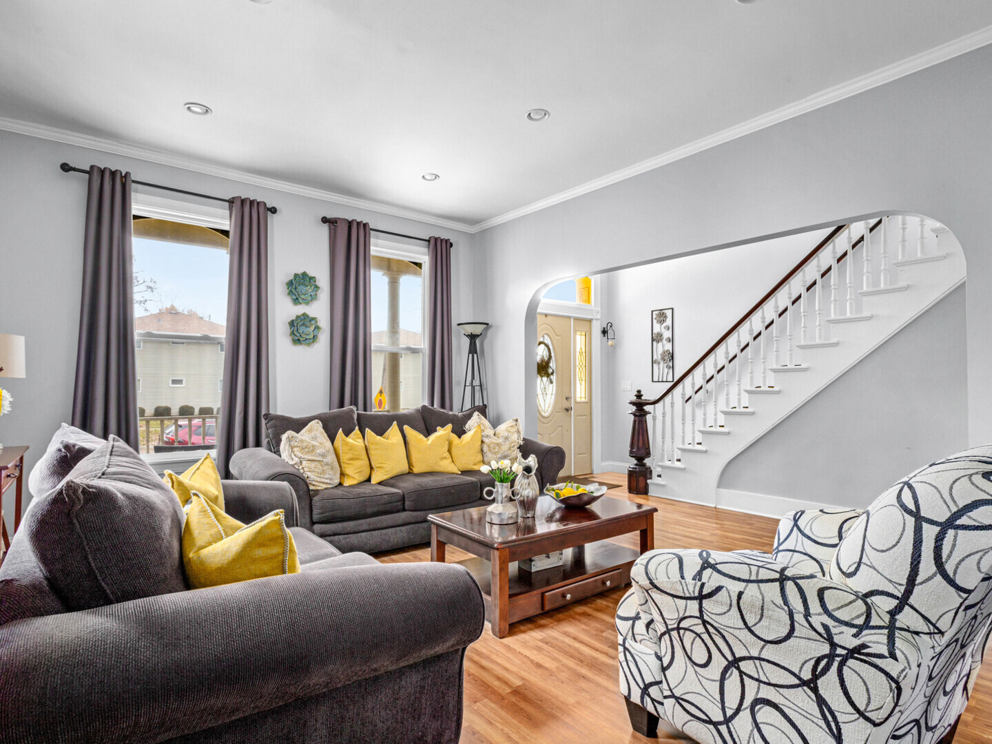 506 Oneida Street Joliet, IL 60435 - Photo 16 of 40 a living room with furniture and a large window