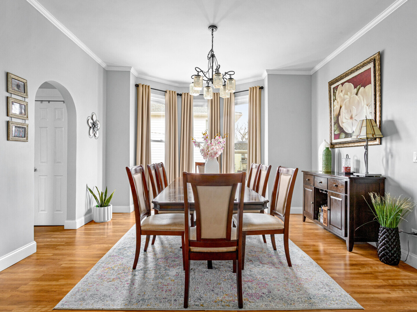 506 Oneida Street Joliet, IL 60435 - Photo 18 of 40 a view of a dining room with furniture window and wooden floor