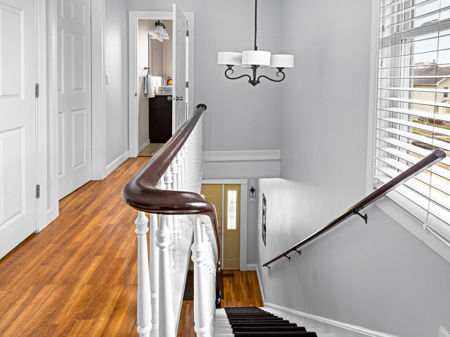 506 Oneida Street Joliet, IL 60435 - Photo 21 of 40 a view of entryway and hall with wooden floor