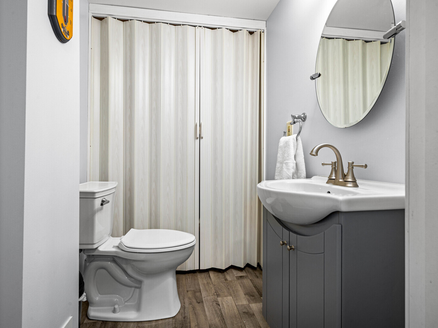 506 Oneida Street Joliet, IL 60435 - Photo 25 of 40 a bathroom with a sink toilet and mirror