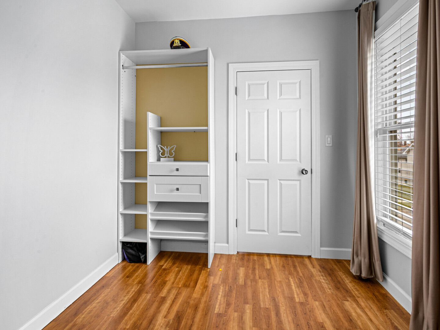 506 Oneida Street Joliet, IL 60435 - Photo 33 of 40 a view of room with walk in closet and window