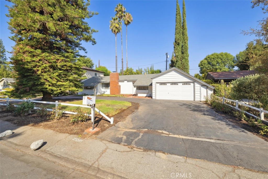 23265 Leonora Drive Woodland Hills, CA 91367 - Photo 2 of 3 an outdoor space with seating